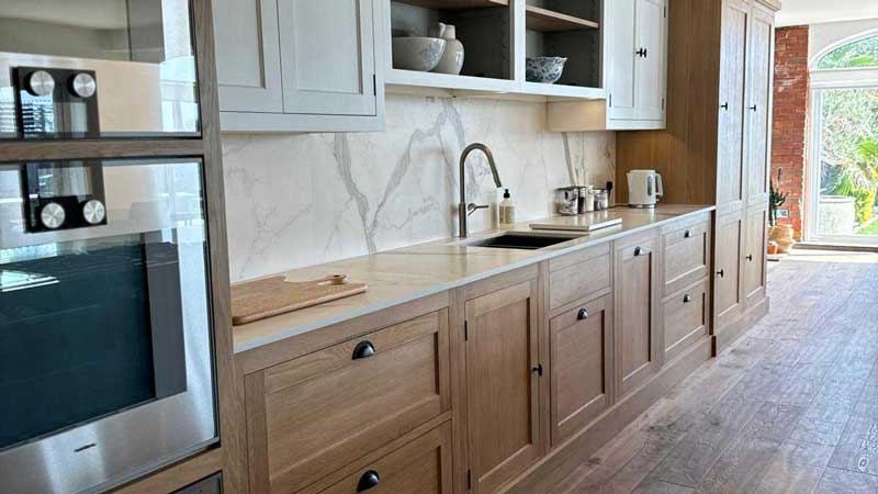 Quartz, granite, marble and porcelain worktop samples side by side