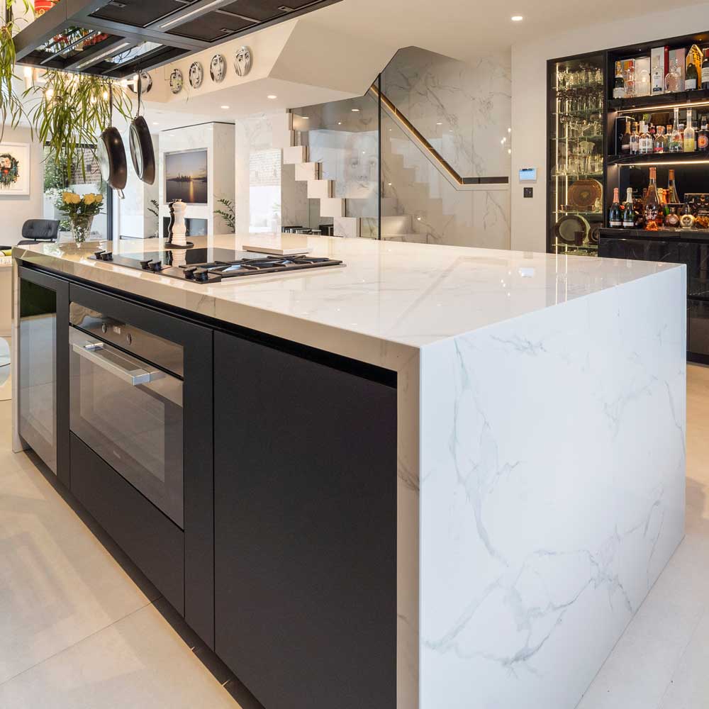 Marble kitchen worktop with mitred waterfall end, installed by Elliott Stone Works